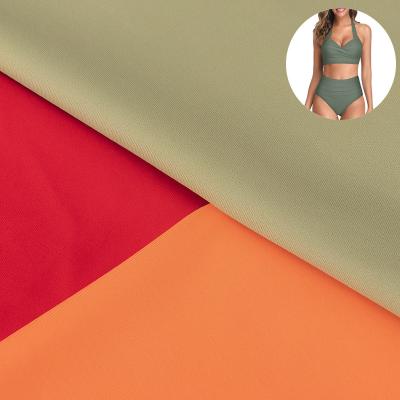 China Nylon Stretch Lycra Plain Knit Fabric Breathable Four Way Knitted Stretch Textiles For Sunscreen Wear Sportswear Swimwear for sale