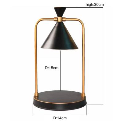 China Romantic Dimmable Bedroom Aromatherapy Bedside Table China Metal Candle Cast Lamp for sale