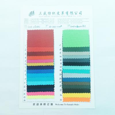 China Waterproof 600D RPET recycled fabric with PU coated for bags and luggage making waterproof 100% polyester rpet for sale