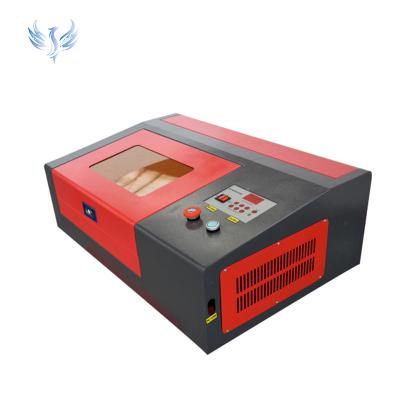 China Water-cooled 40w 50w 60w Small Laser Engraving Machine For Rubber Stamp for sale