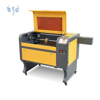 China Water-cooled 80w 100w 4060 co2 laser carving machine and mugs laser engraving machine for wood acrylic bottle nonmetal souvenir for sale