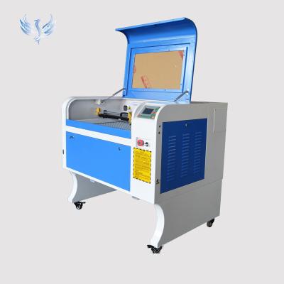 China Water-cooled 60w 6040 High Precision Laser Engraving Rubber Sheet Stamps Making Machine Price for sale