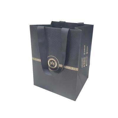 China Recycled materials uniquecolour custom printing commercial luxury gift shopping paper bag for sale