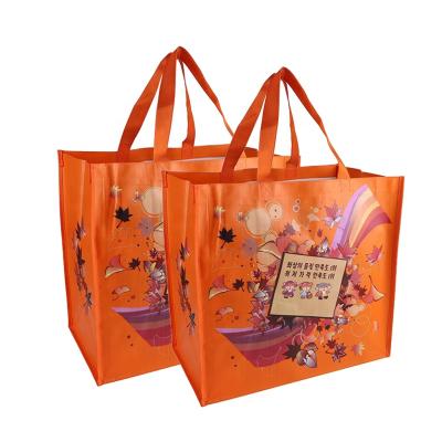 China AZO Free Factory Custom Waterproof Grocery Bags Orange Cartoon Packaging PP Woven Laminated Reusable Shopping Bags for sale