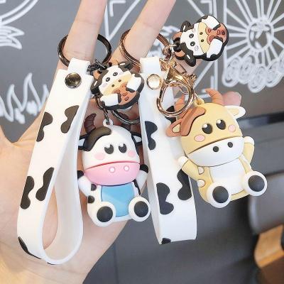 China Bag Charm 3D Rubber Cute Cow Small With Luminous Key Chain Anti-lost Key Ring Car Key Knapsack Cartoon Pendant Design Decoration for sale