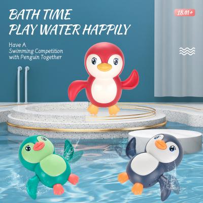 China Plastic Bath Toy Summer Shower Swimming Penguin Small Animals No Battery Funny Bath Roll Up Toy for sale