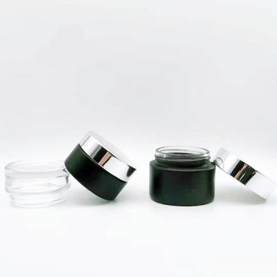 China Lead free bulk empty glass bottles and jars for cosmetic packaging 50g 20g 15g clear cream jar with lid for sale