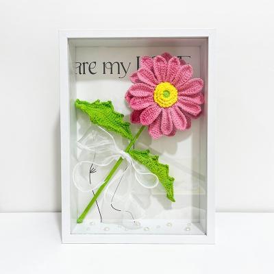 China Handmade Knitted Flower Photo Frame Luxury Wall Backdrop Office Home Decor Daisy Photo Frame Crochet Gift for sale