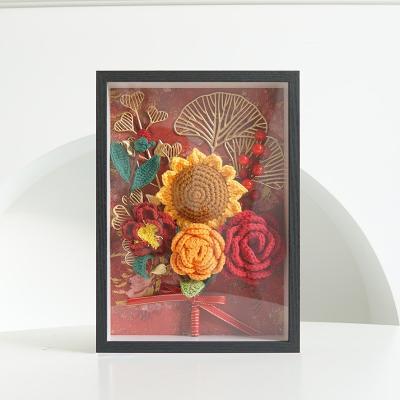 China Handmade knitted crochet luxury gift decoration sunflower flower frame photo backdrop wall flower for sale