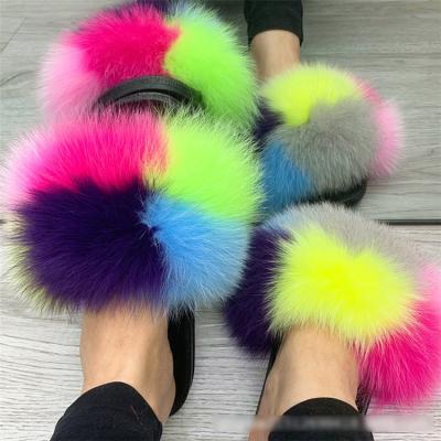 China Fashion Trend Selling Real Fur Slippers Warm Comfortable Genuine Fluffy Women's Fur Slippers Slides for sale