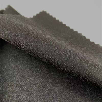 China 1.5m*100m xingyan 50d woven polyester elastic roll interlining for lady's garments and garments for sale