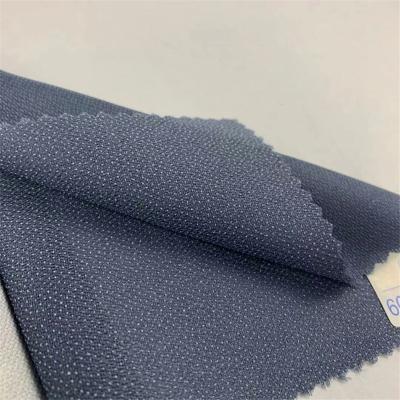 China 1.5m*100m xingyan adhesive interlining roll 75D polyester fabric elastic for clothes for sale