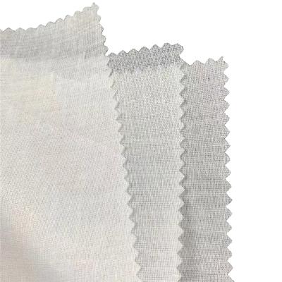 China Iron-on sticking 100gsm xingyan polyester fusible interlining shirt collar fusing interlining for shirts for sale