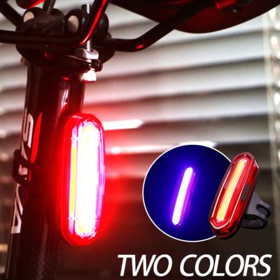 China Dual Color Version-Red/Blue 6 Variable Modes Dual Color USB Rechargeable Blue Red Bike Bicycle Tail Light for sale