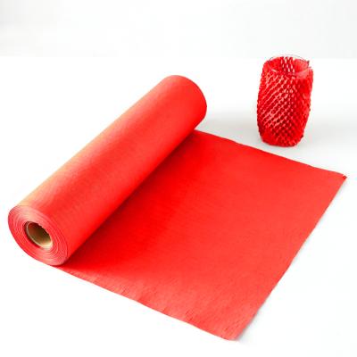 China 500mm*30m Recyclable Red ECO Honeycomb Wrapping Cushion Kraft Paper for sale