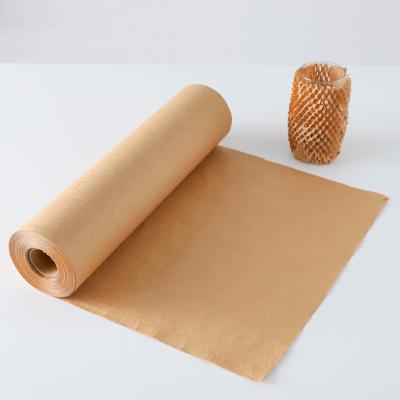 China 500mm*100m Recyclable Kraft Honeycomb Kraft Paper Packing Cushion Paper Recyclable Packaging Paper for sale