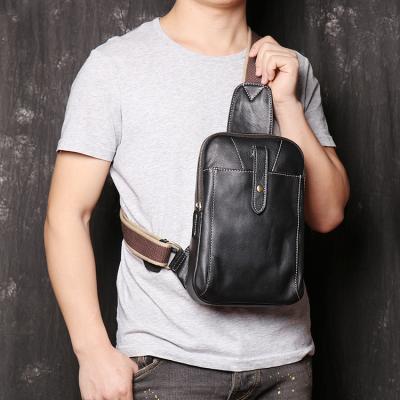 China Real Leather Multifunctional Black Sling Bag Men Mini Chest Bag For Man for sale