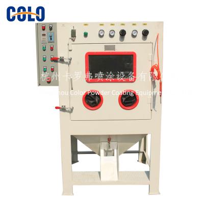 China Non-Toxic Automatic Drum Sandblaster Machine for sale