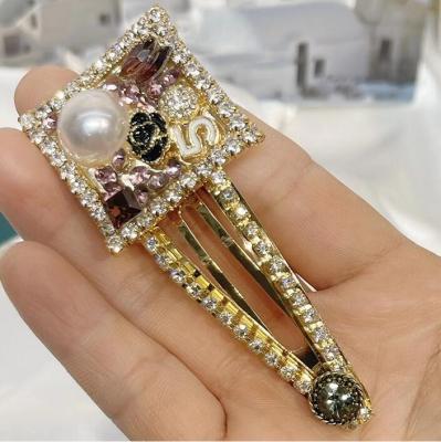 China 2021 New Fashionable Shiny Crystal Flower Digital Hairpin Hair Clip For Women Girl for sale