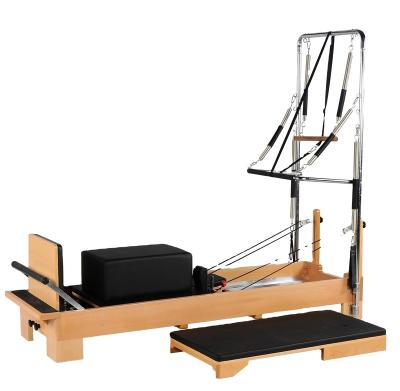 China Hot Sale A+Beech Wood and Stainless Steel Fitness Exercise Pilates Equipment Reformer Gym Pilates Machine Reformer With Half Trapze for sale