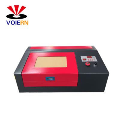 China Laser Engraving Mini Laser Engraving Machine 3020 Laser Seal Machine 40W CO2 for sale