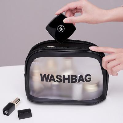 China Durable Portable Large Capacity PVC Waterproof Transparent Makeup Bag Wash Leather Clear Cosmetic Bags For Travel for sale