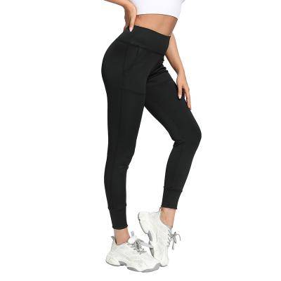 China Active Trainer Running Yoga Breathable High Waist Women Fitness Wear Side Pocket Leggings Black Color With Pockets Workout Yoga Pants Gym L for sale