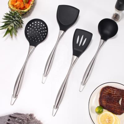 China Non Stick Cookware Stainless Steel Sustainable Kitchen Tools Silicone Kitchen Cooking Spoon Utensil for sale