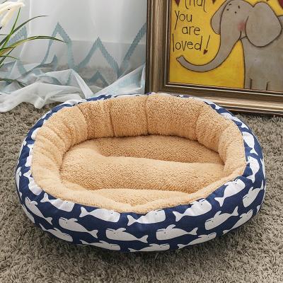 China Soft Warm and Comfortable Waterproof Round Bed Dog Donut Plush Cat Bed Pet Cushion Pet Stocked Bed Wool Lamb for sale