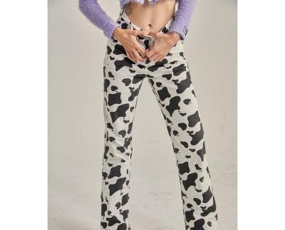 China Anti-wrinkle Cow Style Pattern Women Printed Street With Pockets High Waist Straight Pants Trousers for sale