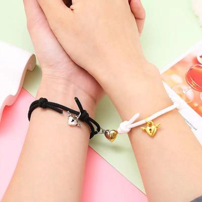 China Amazon Style Magnetic Couples Bracelet Romantic Popular Love Pair Alloy Men's and Women's Handrope Woven Bracelet for sale