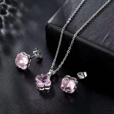 China 2021 romantic European and American new color Crystal Stainless Steel Earring Necklace fashion jewelry set micro clover inlaid set for sale