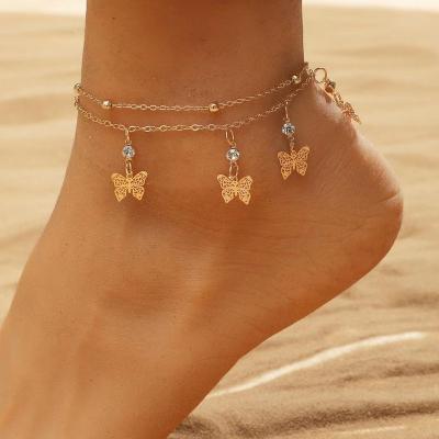 China CLASSIC popular INS alloy double-layer butterfly foot chain beaded hollow foot chain for sale