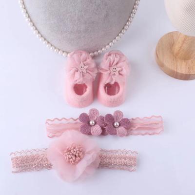 China 0-1 Year Wholesale Cute Newborn Baby Hair Band With Anti Skid Shoes Socks Lace Up Headband Three Piece Set for sale