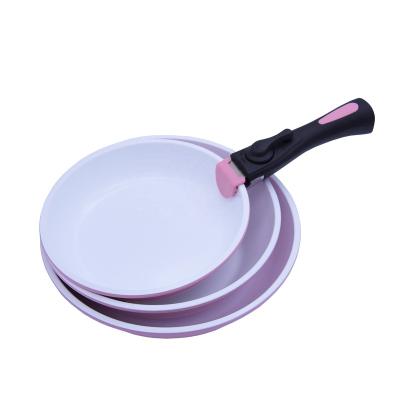 China Sustainable Kitchen Cookware Set With Ceramic Nonstick Coating Pink Pan Pot Detachable Removable Handle for sale