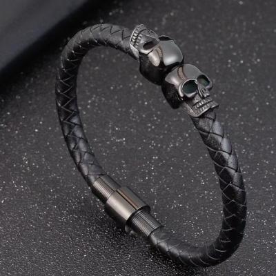 China 2022 New Punk Stainless Steel Ghost Head Leather Braided Bracelet for sale