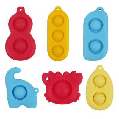 China Silicone DDA2360 Mini Sensory Fidget Toy Hand Squeeze Finger Bubble Keychain Durable Keychain Simple Key Chained Squeeze Person Keychains for sale