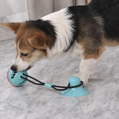 China Viable Small and Medium Dog Tooth Ball Toy Dog Tooth Dragger Suction Cup Suction Silica Gel Pet Toy for sale