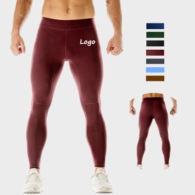 China Good Quality Breathable Jogging Sportswear Men's Compression Running Skin Tights Wholesale Workout Sports Tights Men Gym Gaiters for sale