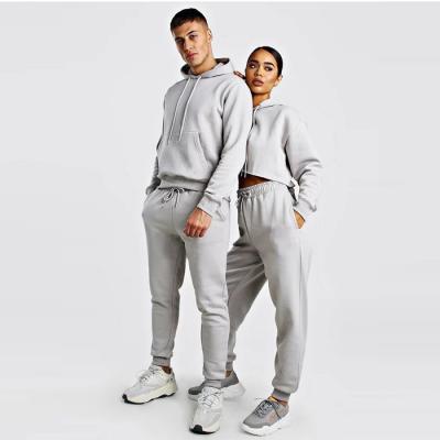 China Wholesale Breathable Winter Plus Size Streetwear Sweat Suits Casual Sportswear Sets Crop Custom Hooded Couples Unisex Tracksuit for sale