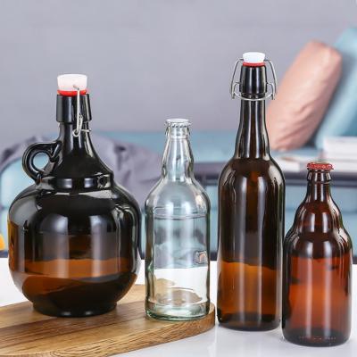 China Beverage Wholesale brown beer bootles 250ml 330ml 500ml 1000ml clear glass beer bottle with crown cap for sale