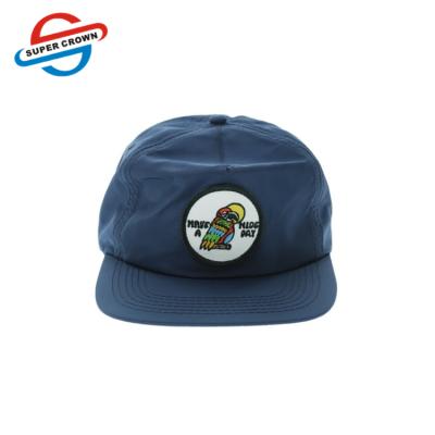 China COMMON custom blue unisex 5 panel 100% nylon hat OEM snapback hat unstructured with flat brim blii dad hat for sale