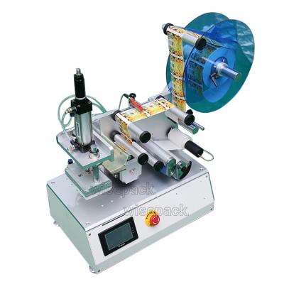 China Semi-automatic juice pouch pouch food foil labeling machine for sale