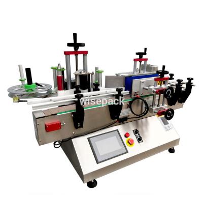 China Automatic food honey jar labeling machine, jar labler machine label dispenser for sale