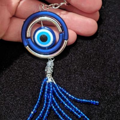 China Fashion Evil Eye Hamsa Protection Nazar Good Luck Charm Turkish Blue Key Chain Keychain C504 for sale