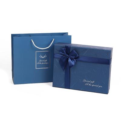 China Dongguan Yongy Recyclable Free Design Custom Blue Cardboard Paper Wedding Christmas Gift Box Packaging With And Bag for sale