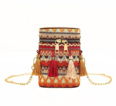 China Ethnic Fashoion Style Ladies Bucket Bag New Tassel Woven Bag Messenger Bag for sale