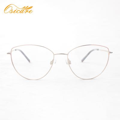 China Slim gold metal frame; Adjustable nose guards; 2021 newest fashion stylish cat-eye eyewear and double color metal optical frame for sale