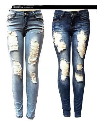 China New Explosion Style Women's Worn Holes Jeans QUICK DRY Medium Waist Worn Pants Spring And Summer Trousers for sale