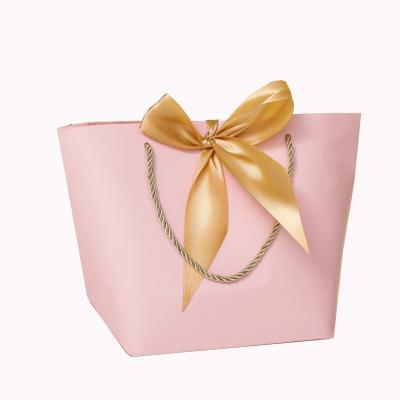 China Recyclable Reusable Boutique Customized Printing Practical Luxury Paper Rose Craft Logo Gift Bags With Ribbon for sale